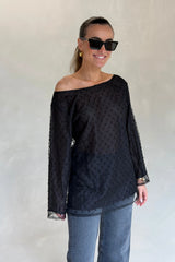The Eloise Beaded Mini Noir by Solaqua – sheer beaded mini dress with off shoulder neckline and oversized fit.