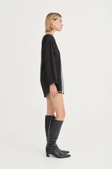 The Eloise Beaded Mini Noir by Solaqua – sheer beaded mini dress with off shoulder neckline and oversized fit.