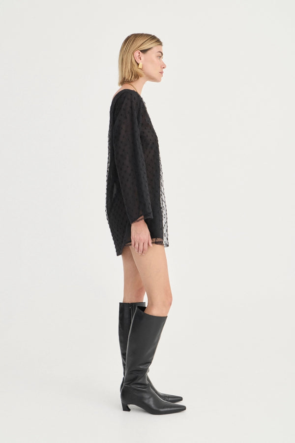 The Eloise Beaded Mini Noir by Solaqua – sheer beaded mini dress with off shoulder neckline and oversized fit.