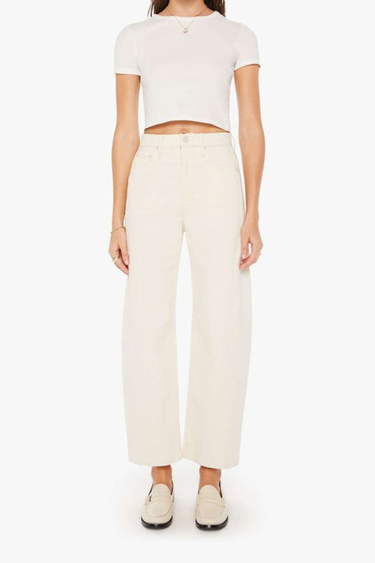The Half-Pipe in Act Natural by MOTHER, high-waisted cream jeans with wide curved legs, tonal hardware, and a clean minimal finish.