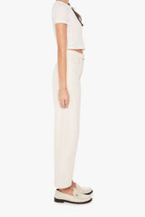 The Half-Pipe in Act Natural by MOTHER, high-waisted cream jeans with wide curved legs, tonal hardware, and a clean minimal finish.
