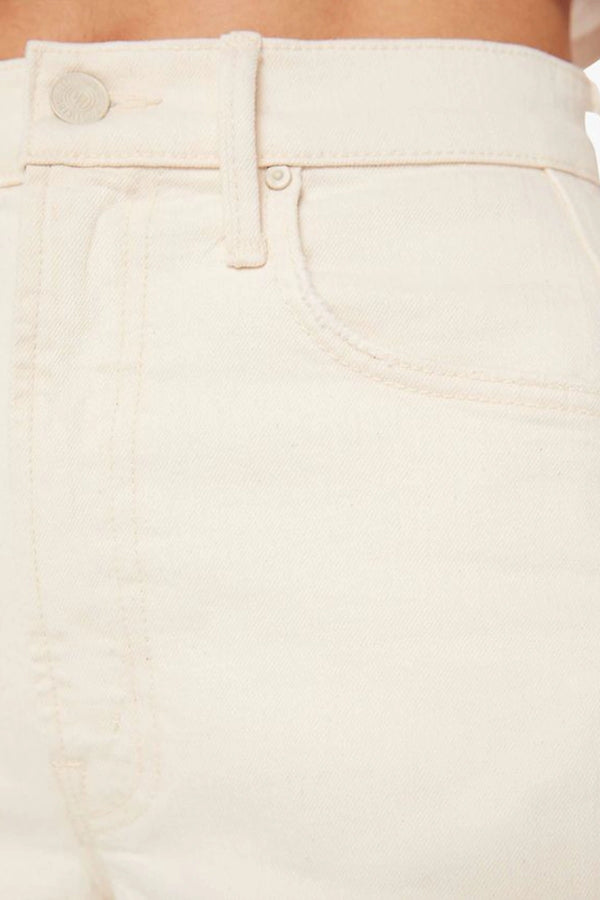 The Half-Pipe in Act Natural by MOTHER, high-waisted cream jeans with wide curved legs, tonal hardware, and a clean minimal finish.