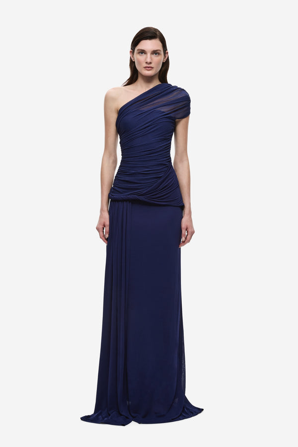 The Interwoven Maxi Dress Deep Blue by Misha – one shoulder silk tulle maxi dress with ruched waist and waterfall sash.