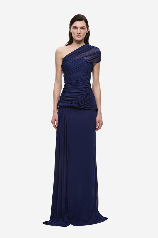 The Interwoven Maxi Dress Deep Blue by Misha – one shoulder silk tulle maxi dress with ruched waist and waterfall sash.