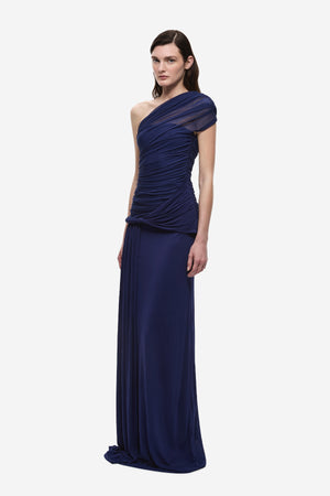 The Interwoven Maxi Dress Deep Blue by Misha – one shoulder silk tulle maxi dress with ruched waist and waterfall sash.