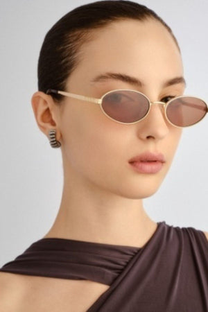 The Kendall Gold by Luv Lou - small oval sunglasses with gold metal frame and brown mono lenses, perfect for refined everyday styling.