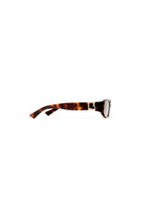 Lottie in Tortoise by Luv Lou, luxe rectangle sunglasses with sculpted angles, gold hardware, and charcoal gradient CR39 lenses.