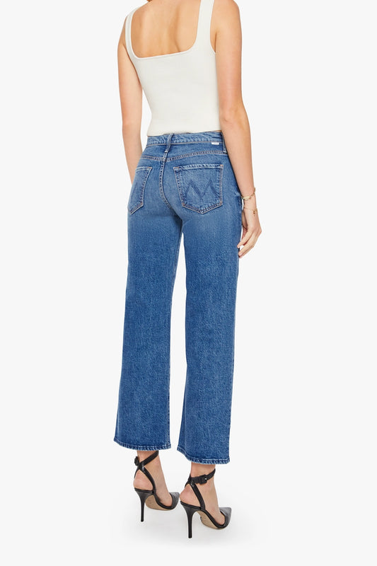 The Mid Rise Maven Flood Thrill Seeker by MOTHER – wide leg jeans in a faded blue wash. Perfect for everyday styling.