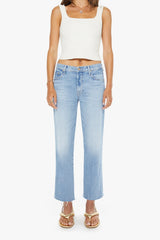 The Mid Rise Rambler Zip Ankle Fray Comeback Kid by MOTHER – mid rise straight leg jeans with frayed hem and faded wash.