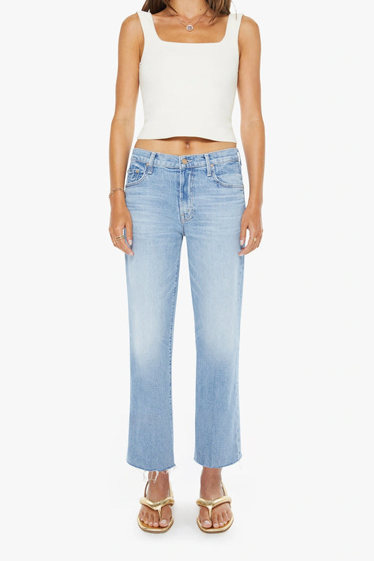 The Mid Rise Rambler Zip Ankle Fray Comeback Kid by MOTHER – mid rise straight leg jeans with frayed hem and faded wash.