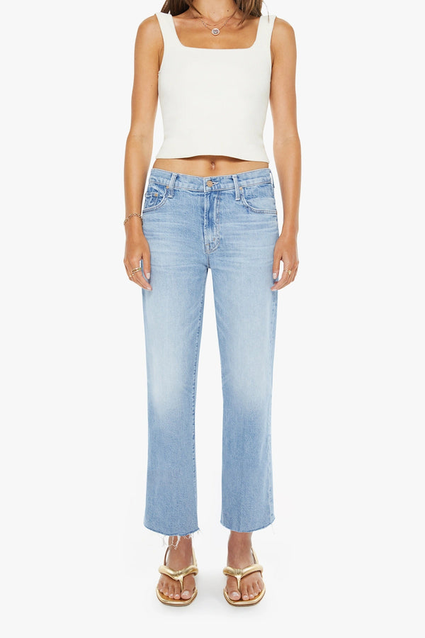 The Mid Rise Rambler Zip Ankle Fray Comeback Kid by MOTHER – mid rise straight leg jeans with frayed hem and faded wash.