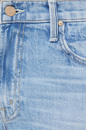 The Mid Rise Rambler Zip Ankle Fray Comeback Kid by MOTHER – mid rise straight leg jeans with frayed hem and faded wash.