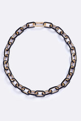 The OG Necklace Black Glow by Emma Pills – gold-plated enamel chain necklace with glossy black finish.
