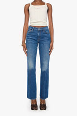 The Outsider Sneak Call Me Wild by MOTHER – bootcut jeans in rigid blue denim. Perfect for everyday styling.