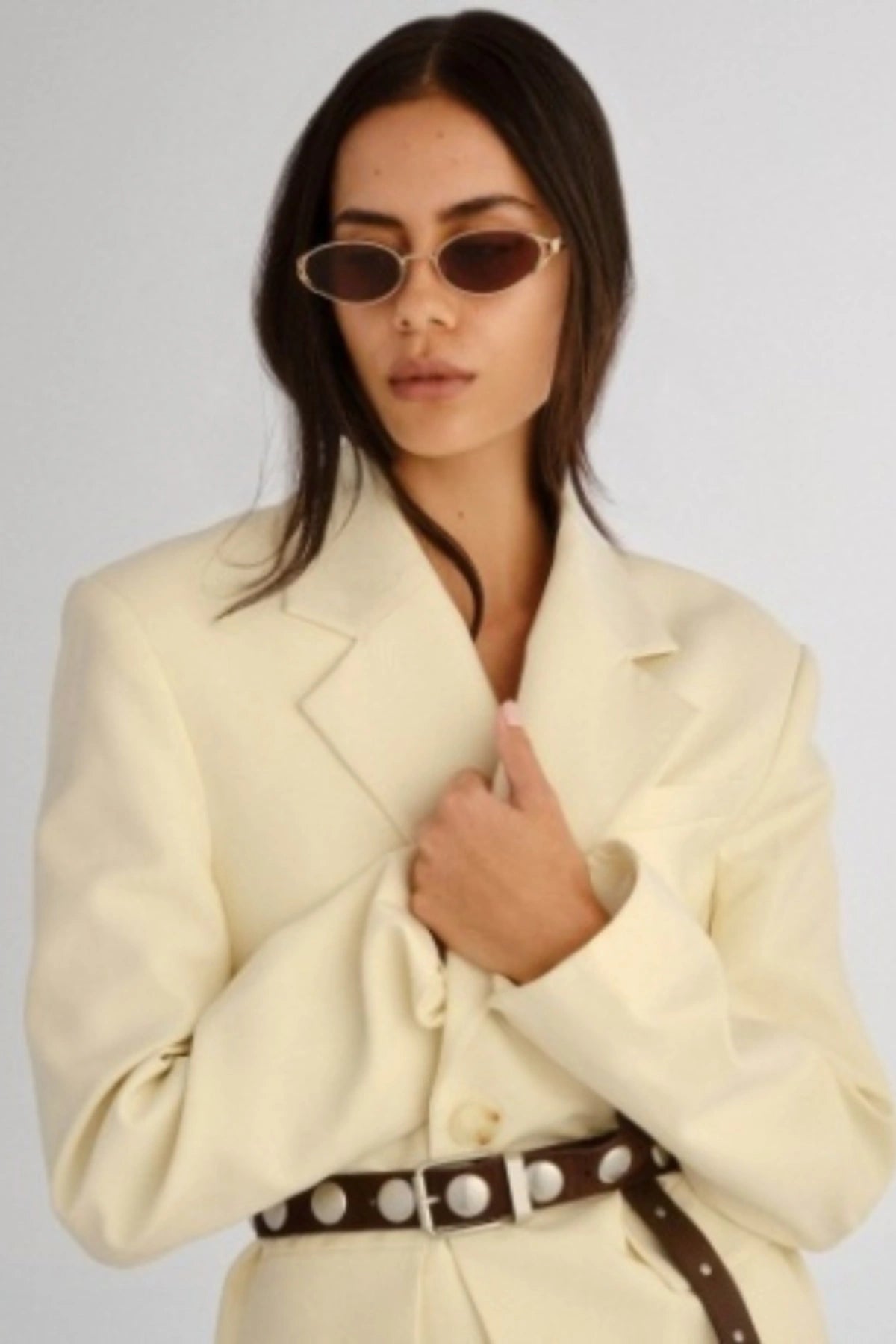 Paloma in Gold by Luv Lou, vintage-inspired oval sunglasses with split temples, brown mono CR39 lenses, and debossed hinge.