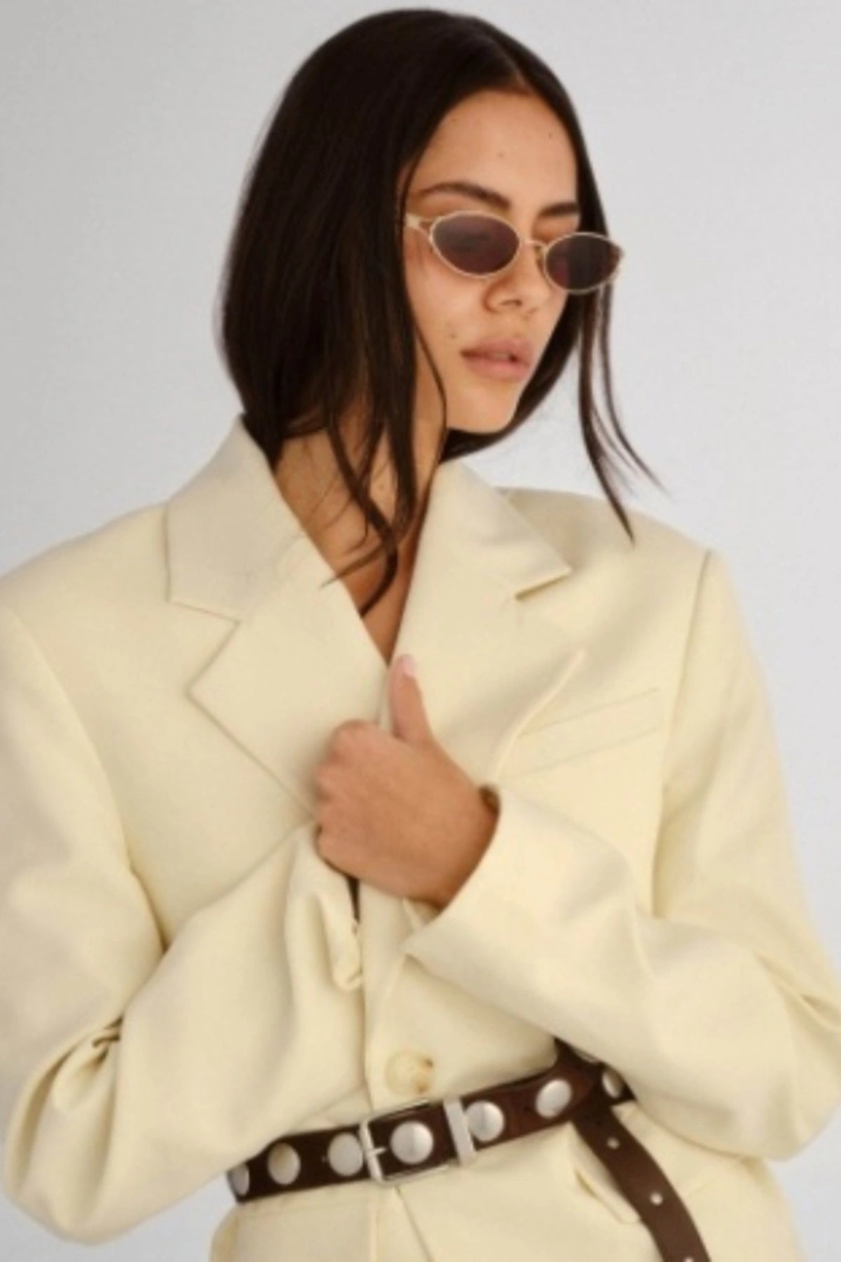 Paloma in Gold by Luv Lou, vintage-inspired oval sunglasses with split temples, brown mono CR39 lenses, and debossed hinge.