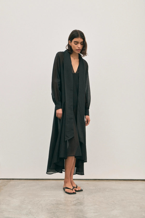 The Pepa Dress Noir by Solaqua – sheer cotton silk layering dress with scarf panels and flowing silhouette.