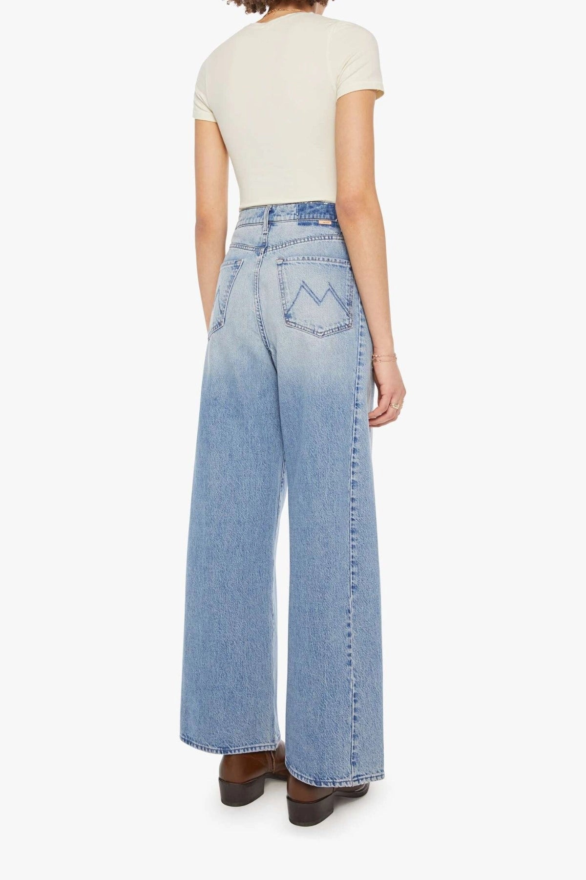 The Pipe Dream Button Sneak High Rise Jeans in Leap At The Chance by MOTHER, bold barrel-leg denim with contrast stitching and side insets for a structured, statement fit.