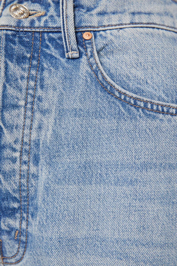 The Pipe Dream Button Sneak High Rise Jeans in Leap At The Chance by MOTHER, bold barrel-leg denim with contrast stitching and side insets for a structured, statement fit.