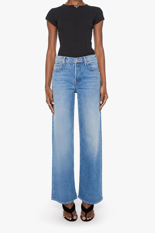 The Rerun Zip Skimp Just An Animal by MOTHER – high rise wide leg jeans in blue denim. Perfect for everyday styling.
