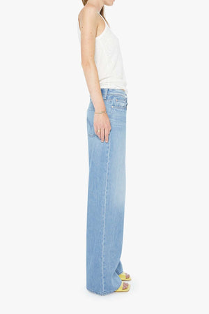The Rerun Zip Sneak Last Bite by MOTHER - wide leg jeans in vintage blue wash, designed for a relaxed oversized fit.
