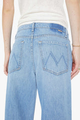 The Rerun Zip Sneak Last Bite by MOTHER - wide leg jeans in vintage blue wash, designed for a relaxed oversized fit.
