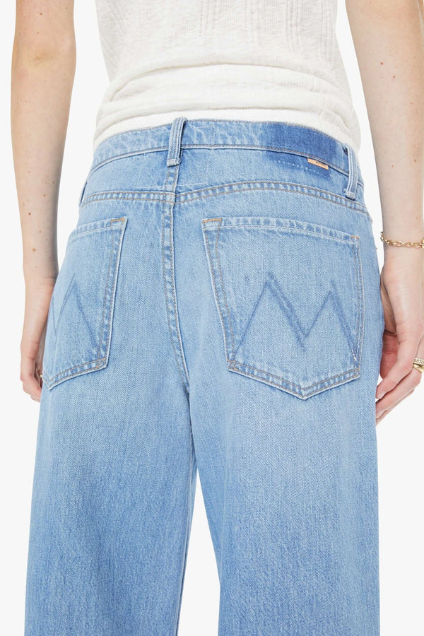The Rerun Zip Sneak Last Bite by MOTHER - wide leg jeans in vintage blue wash, designed for a relaxed oversized fit.