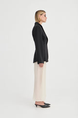 The Saasha Beaded Skirt Ivory by Solaqua – sheer beaded maxi skirt with side split and fluid silhouette.