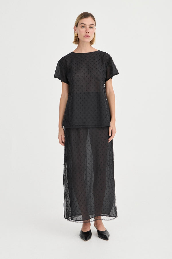 The Saasha Beaded Skirt Noir by Solaqua – sheer beaded maxi skirt with side split and fluid silhouette.