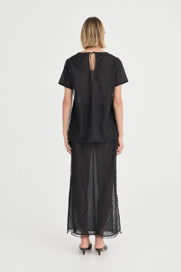The Saasha Beaded Skirt Noir by Solaqua – sheer beaded maxi skirt with side split and fluid silhouette.