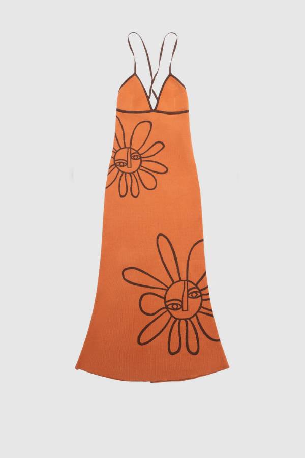 The Wolf Gang Soleil Knit Midi Dress in Jaffa, a form-fitting intarsia knit midi with floral motifs, V-scoop neckline, contrast straps, and low back.