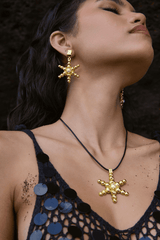 Thea Earrings Gold by Mountain and Moon – gold earrings with pearl drop and hammered finish. Perfect for elevated styling.