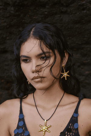 Thea Earrings Gold by Mountain and Moon – gold earrings with pearl drop and hammered finish. Perfect for elevated styling.