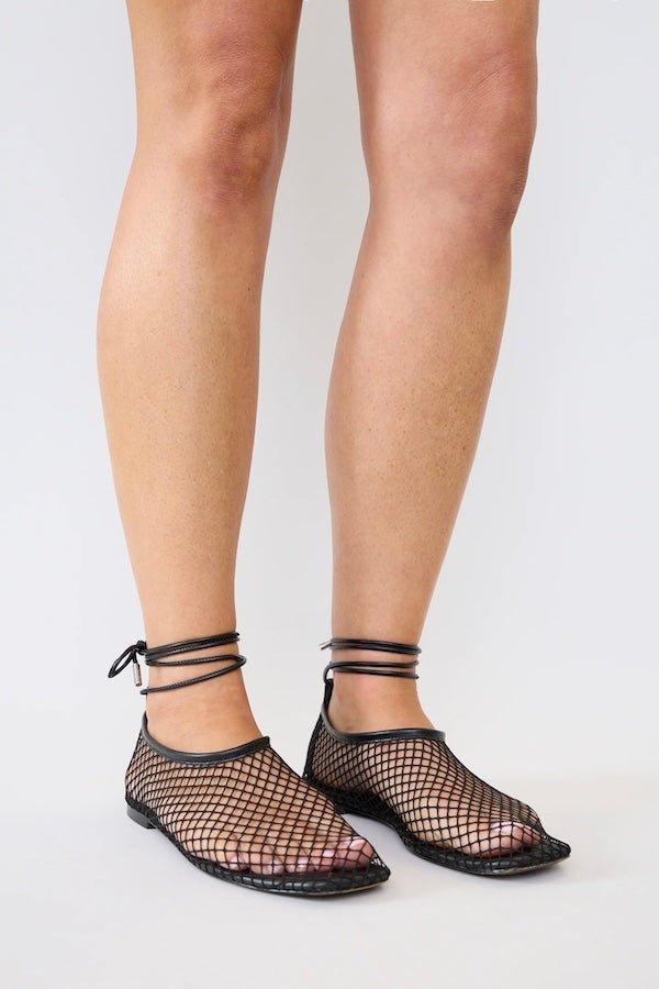 Theos Flat Black White by Pfeiffer, mesh flats with lace up detail and square toe. Perfect for everyday wear or standout styling.