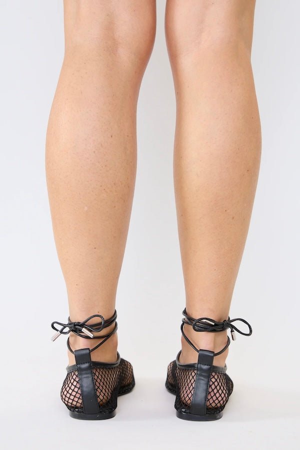 Theos Flat Black White by Pfeiffer, mesh flats with lace up detail and square toe. Perfect for everyday wear or standout styling.