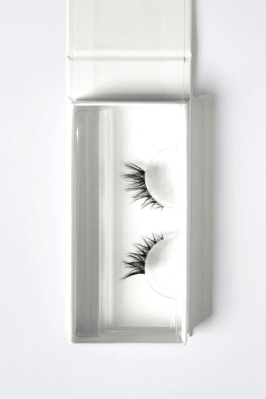 Three Fourths Lash 0.4 by OWN Beauty Essentials – feathered corner lashes with soft volume and lifted outer lash effect.