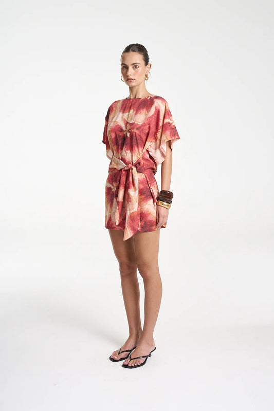 Tie Front Dress by Summi Summi — a Tencel Aloha-print mini with a high neck and adjustable wrap tie, perfect for casual or polished summer looks.