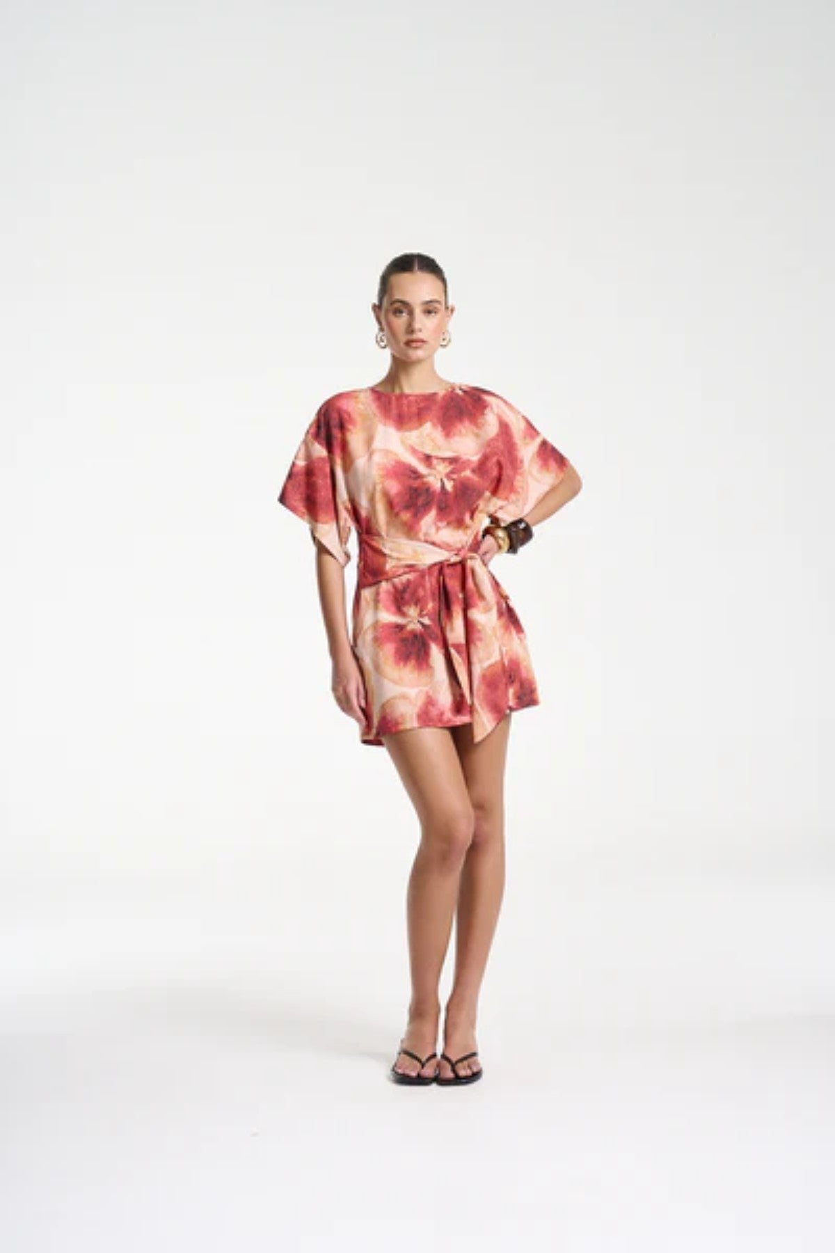 Tie Front Dress by Summi Summi — a Tencel Aloha-print mini with a high neck and adjustable wrap tie, perfect for casual or polished summer looks.