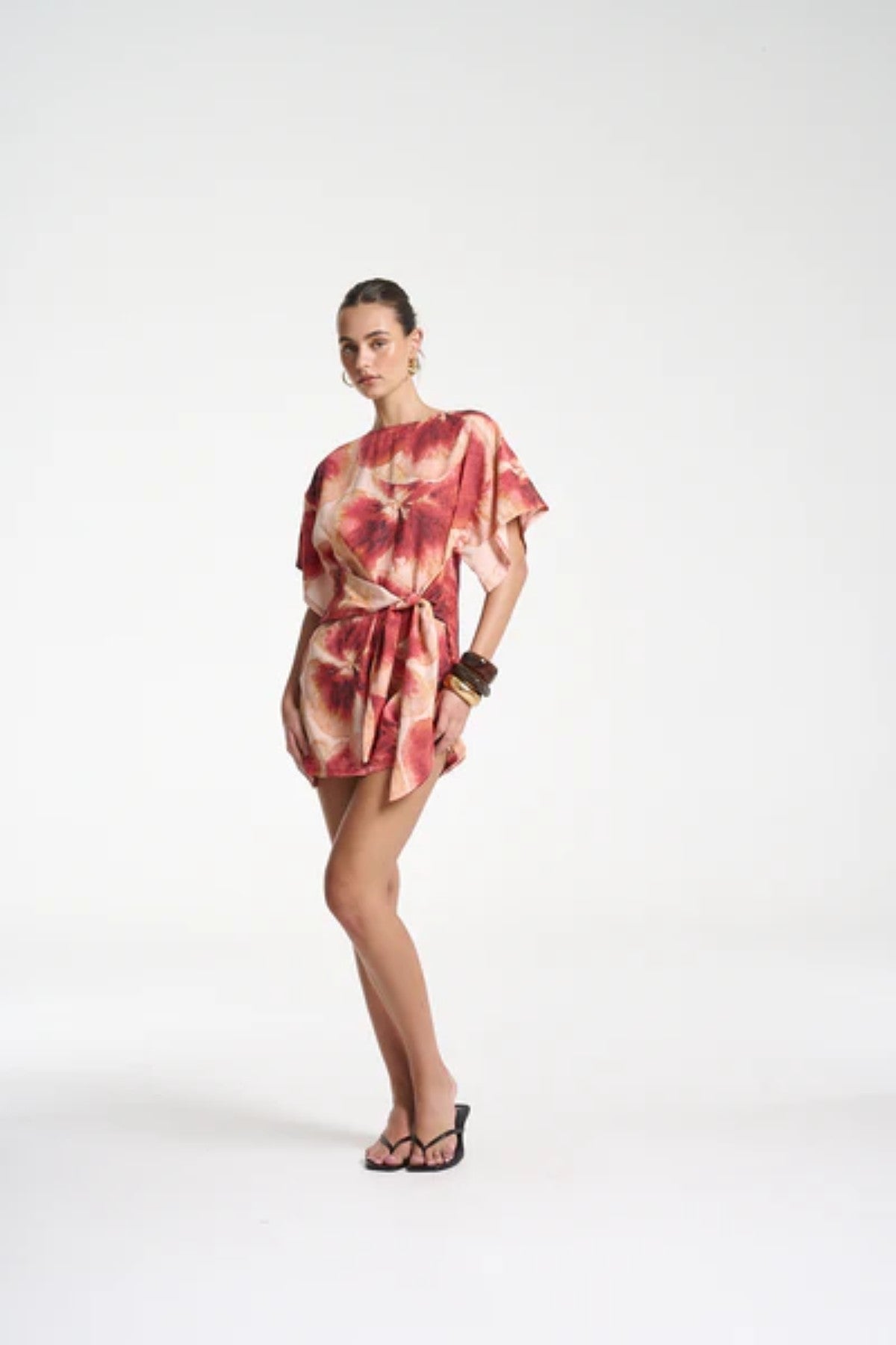 Tie Front Dress by Summi Summi — a Tencel Aloha-print mini with a high neck and adjustable wrap tie, perfect for casual or polished summer looks.