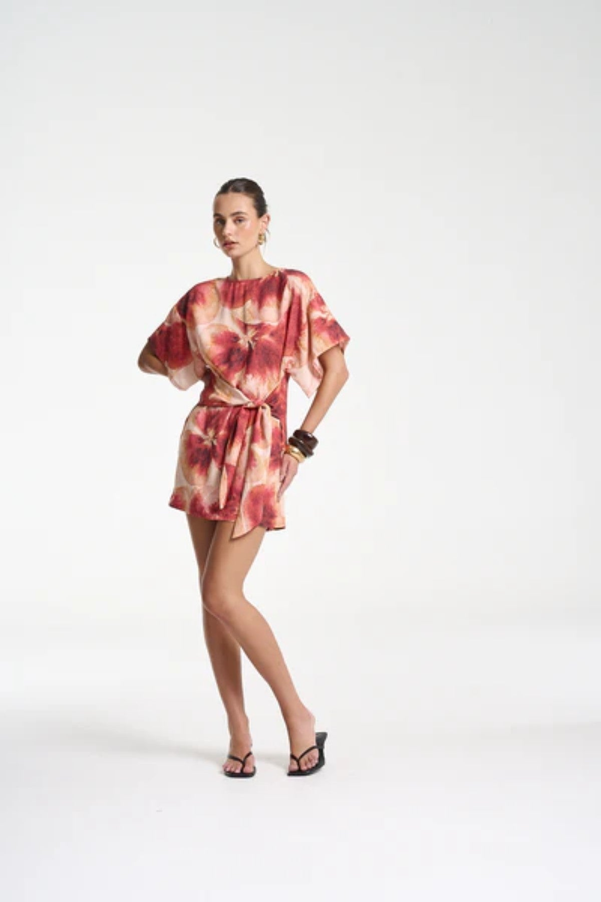 Tie Front Dress by Summi Summi — a Tencel Aloha-print mini with a high neck and adjustable wrap tie, perfect for casual or polished summer looks.