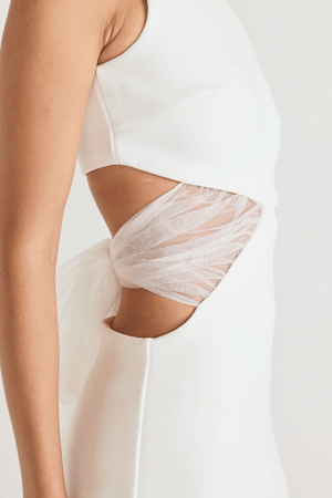 Bellina Dress Black by Tojhà, a sculptural crepe maxi with waist cut-out and mesh tie detail. Perfect for striking modern evening looks.