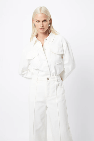 Transpire Shirt White by Mossman – a relaxed cotton shirt with patch pockets and curved hem. Perfect for casual styling.