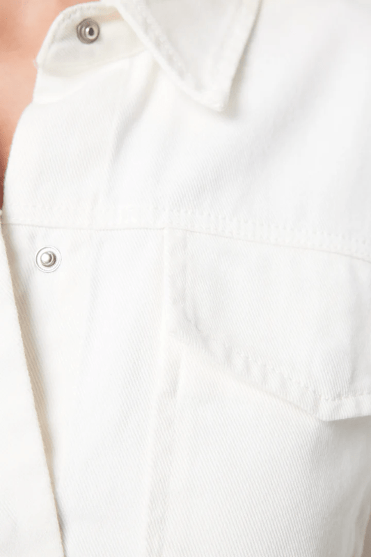 Transpire Shirt White by Mossman – a relaxed cotton shirt with patch pockets and curved hem. Perfect for casual styling.