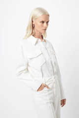 Transpire Shirt White by Mossman – a relaxed cotton shirt with patch pockets and curved hem. Perfect for casual styling.