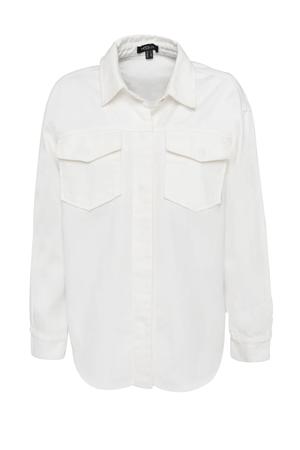 Transpire Shirt White by Mossman – a relaxed cotton shirt with patch pockets and curved hem. Perfect for casual styling.