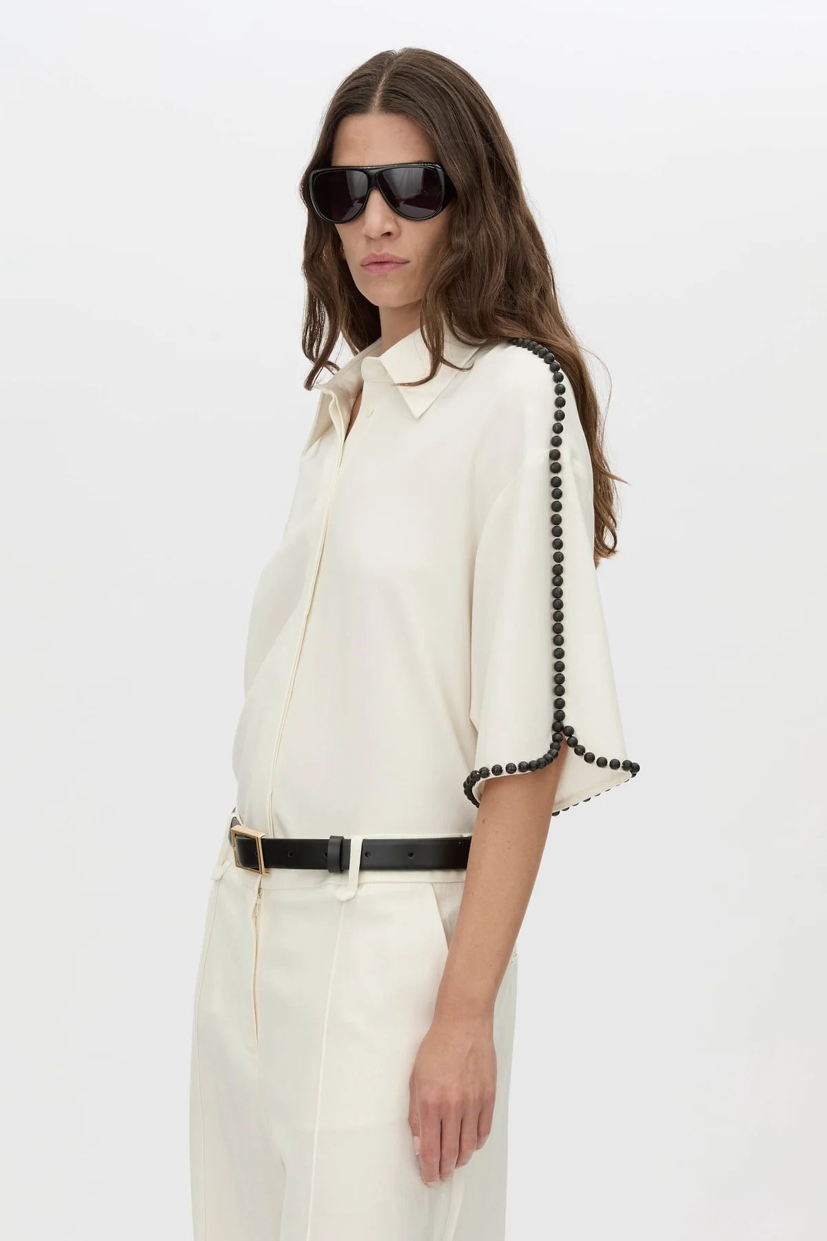 Trevi Shirt by in Cream Camilla and Marc – a cream short-sleeve shirt with hand-sewn bead details and clean tailoring, perfect for polished warm days.