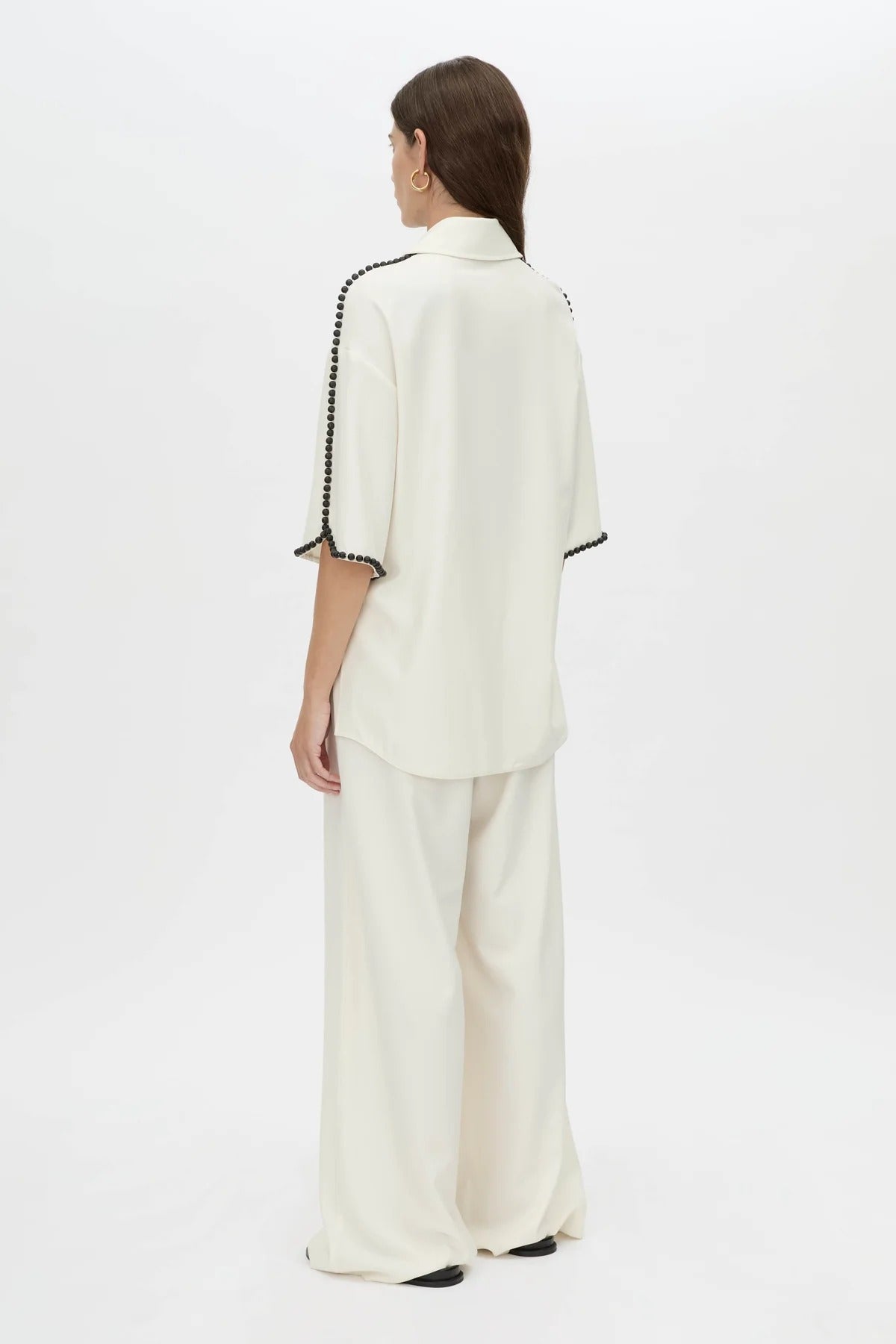 Trevi Shirt by in Cream Camilla and Marc – a cream short-sleeve shirt with hand-sewn bead details and clean tailoring, perfect for polished warm days.