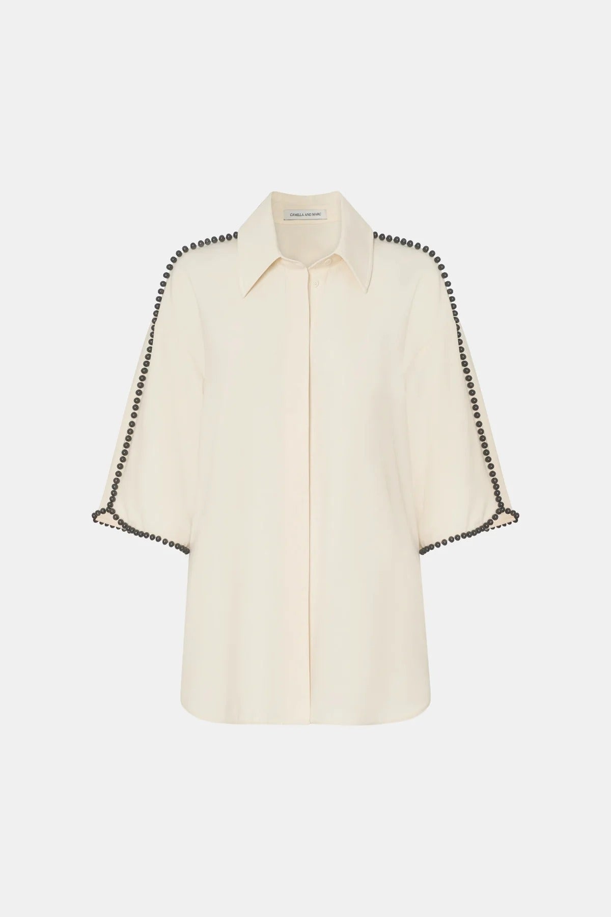 Trevi Shirt by in Cream Camilla and Marc – a cream short-sleeve shirt with hand-sewn bead details and clean tailoring, perfect for polished warm days.