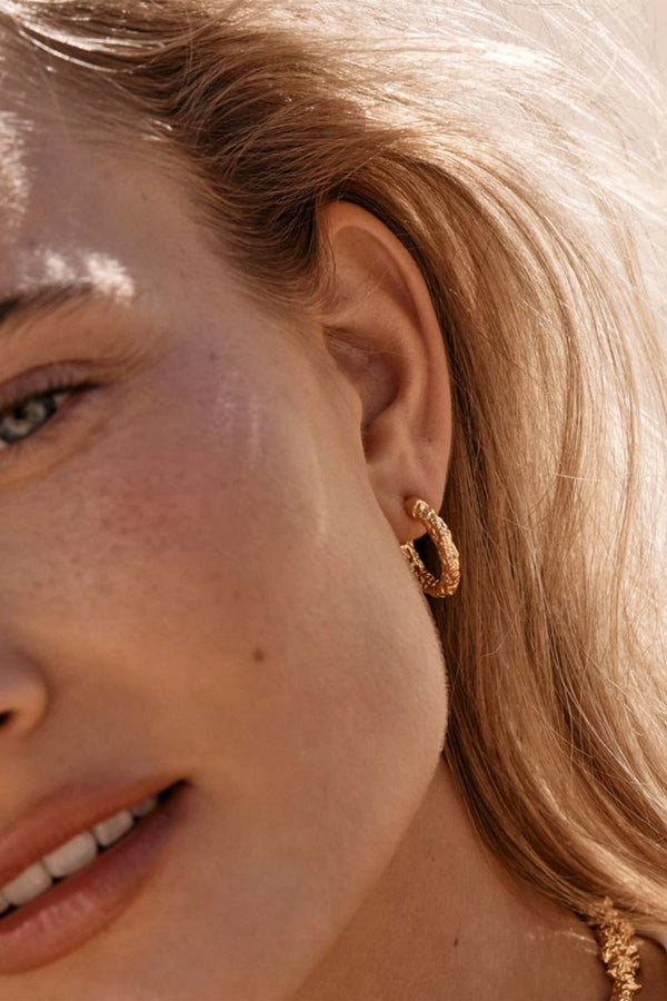Tubac Earrings by Amber Sceats - textured gold hoop earrings with polished finish, designed for effortless everyday styling.