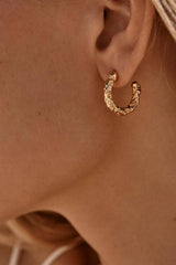 Tubac Earrings by Amber Sceats - textured gold hoop earrings with polished finish, designed for effortless everyday styling.